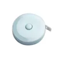 Cinta métrica retráctil redonda azul claro, diseño compacto y portátil para medidas. - Cinta métrica de cuero azul