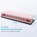 Pink 12-hole mushroom hole puncher for loose-leaf notebooks, durable office stationery tool. - Orange