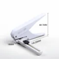 Witte perforator met enkel gat, verstelbare liniaal en positioneringsgids voor kantoor en school. - Wit
