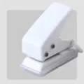 White mini single-hole puncher for paper binding, portable handheld stationery tool, 8 sheets. - White