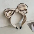 Elegant beige oversized bow headband with contrast brown piping for high hair style look - Beige