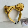Elegant oversized yellow bow headband with brown piping for high cranial top effect - Yellow