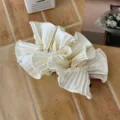 Elegant ballet-style cream pleated satin banana hair clip with delicate pearl accents - Beige