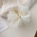 Elegant off-white mesh bow hair claw clip with central pearl cluster for women - Off White