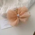 Elegant oversized apricot mesh bow hair claw clip featuring faux pearl accents in Korean style - Bright Khaki
