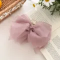 Elegant oversized dusty pink mesh bow hair claw clip for stylish Korean hair styling - Purple