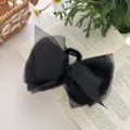 Oversized black mesh bow hair claw clip for elegant hair styling and extra volume - Black
