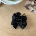 Elegant black satin bow hair claw clip with delicate rhinestone embellishments for hair - Bow Claw Clip / Pearlescent Black