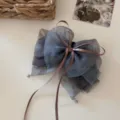Elegant blue marble patterned organza bow hair clip featuring delicate beads and ribbons - Blue Brown