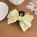 Elegante pinza para el pelo con lazo a rayas amarillas y blancas moda - Amarillo