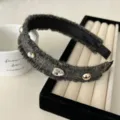 Elegant grey tweed knit headband embellished with rhinestones and gold tone studs - Black