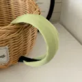 Pastel green knitted wide headband with pleated texture and non-slip lining for women - Turquoise Green