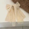 Cream polka dot bow hair claw clip with long ribbons and pearl accents - Chiffon Polka Dot Cream