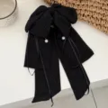 Elegant black polka dot fabric bow hair claw clip featuring long streamers and pearl details - Chiffon Polka Dot Black