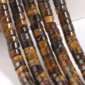 Detail shot of 2x4mm natural stone disc loose beads, perfect for DIY jewelry accessories. - Brownish Yellow