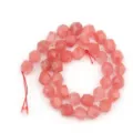 Detailed view of faceted pink stone loose beads, perfect for DIY handmade jewelry crafting. - 26