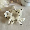 Elegant cream white polka dot bow scrunchie with chic ruffled fabric edge for hair - Beige Polka Dot