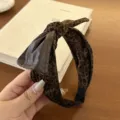 Detailed view of luxury velvet leopard print wide headband with stylish leather bow - Bow