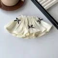 Elegant cream pleated skirt hair clip hair accessory with black bows and mini pearls - Beige
