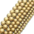 Gold matte round beads detail, perfect for DIY bracelet making and jewelry design accessories. - 6mm (Approx. 62 Beads per Strand) / Matte Gold