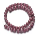 Close-up detail of purple cat eye beads strand, smooth matte finish, DIY jewelry making. - 6mm, Approx. 62 Pcs per Strand / Color 1