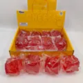 Set of red translucent square squishy stress relief toys in yellow cheese display box - Vaseline Cube / Red