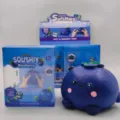 Detail shot of a jumbo scented blueberry squishy toy with its original retail packaging. - Simulation Large Blueberry / Purple