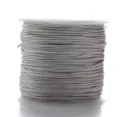 Zilveren nylon koordspoel voor het maken van DIY-sieraden en handgemaakte armbanden. - Zilverijs