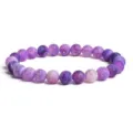 Purple weathered agate frosted round bead bracelet detail view showing unique texture. - Purple