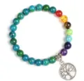 Detailed shot of chakra gemstone bead bracelet with silver tree of life charm accessory. - Style 5
