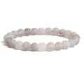 Detailed close-up of frosted weathered agate beads bracelet, natural cracked texture design. - Off-White