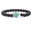 Close-up detail shot of black matte beaded bracelet featuring a turquoise turtle charm. - Matte Black