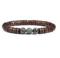 Detailed view of wooden spacer bracelet featuring three green stone beads in the center. - No. 29