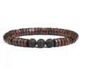 Detail view of wooden disc beads and black lava stone bracelet texture and natural material craft. - No. 27