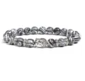 Black and white agate stone beaded stretch bracelet featuring a silver Buddha head charm. - Silk Agate