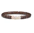 Close-up detail of wooden disc spacer and natural agate beads bracelet jewelry component. - Size 9