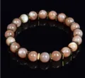 Bracelet de perles en pierres précieuses élégant avec des intercallaires métalliques carrés. - Orange
