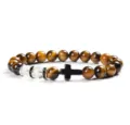 Detailed view of the 8mm yellow tiger eye and white quartz cross bracelet bead gift. - 5