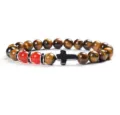 Detail of 8mm yellow tiger eye stone and red agate beaded bracelet with metal cross charm. - 21