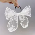 Elegant large white lace bow hair tie featuring delicate floral embroidery patterns - White Lace Bow