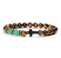 8mm yellow tiger eye and green chalcedony beaded bracelet with black cross charm. - 2