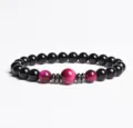 Close-up detail view of gemstone beaded bracelet with black and red tiger eye beads. - Finished Bracelet Elastic approx 20cm / Pink Cat's Eye