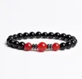 Detailed close-up of the elegant black and red beaded bracelet featuring chic metallic spacers. - Finished Bracelet Elastic approx 20cm / Carnelian