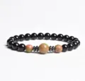 Close-up of 8mm black bead unakite spacer bracelet detail showing natural stone texture. - Finished Bracelet Elastic approx 20cm / Unakite