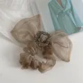 Elegant champagne organza bow scrunchie featuring a sparkling rhinestone buckle. - Rhinestone Buckle Style (210916) / Khaki