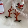 Mollette festive per capelli a corno di renna marrone floccato per accessori di Natale. - Stile Corno di Base / Caffè