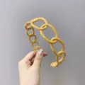 Trendy yellow plastic chain-link headband with glossy finish for women hair styling - Yellow