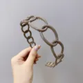 Elegant brown plastic chain-link hairband with non-slip teeth for daily styling - Cocoa