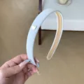 Elegant French vintage high-cranium headband in light blue with white heart detail - Off White