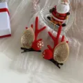 Mollette per capelli corna di Natale rosse con orecchie glitterate e pompon festivi - Decorazione Orecchio Paillettes Paio / Rosso